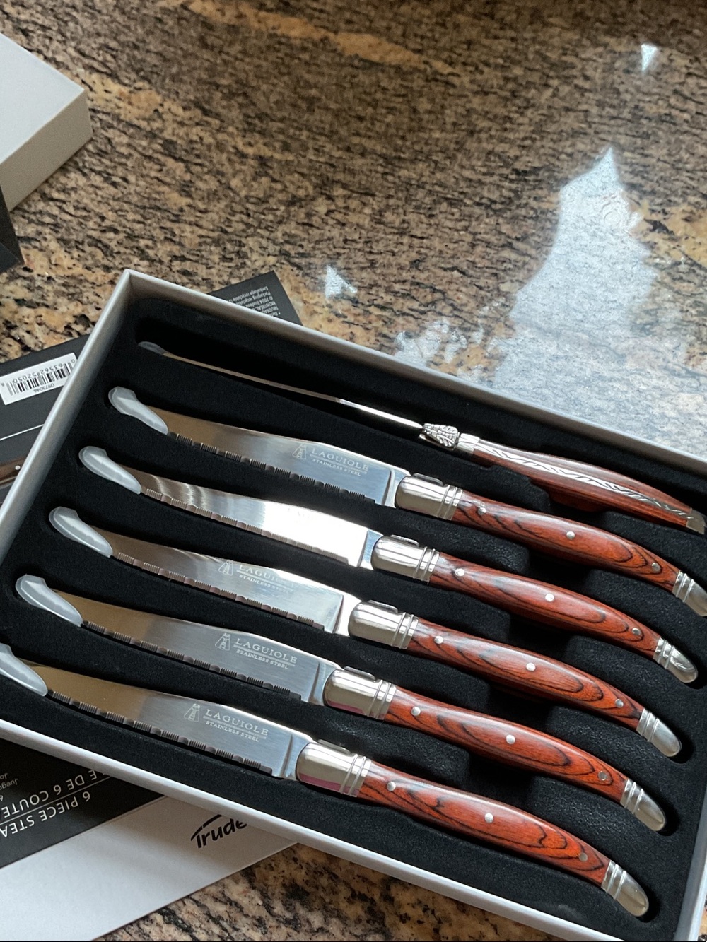 Laguiole Steak Knife Set with Red Wood-Grain Handles and Silver Blades